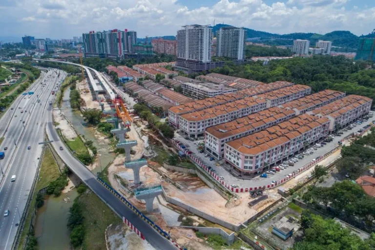 Aerial view of the advancing of launching gantry for segmental box girder launch at the Damansara Damai MRT Station site