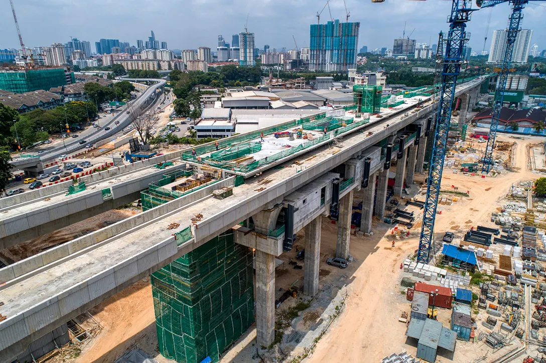 Aerial view of the Kuchai MRT Station site showing the station concourse, intermediate, platform level and installation of steel structure in progress.