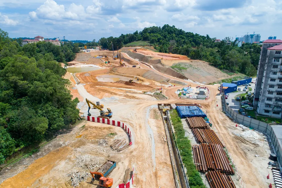 Earthworks in progress for viaduct alignment at the upcoming Taman Naga Emas Station site.