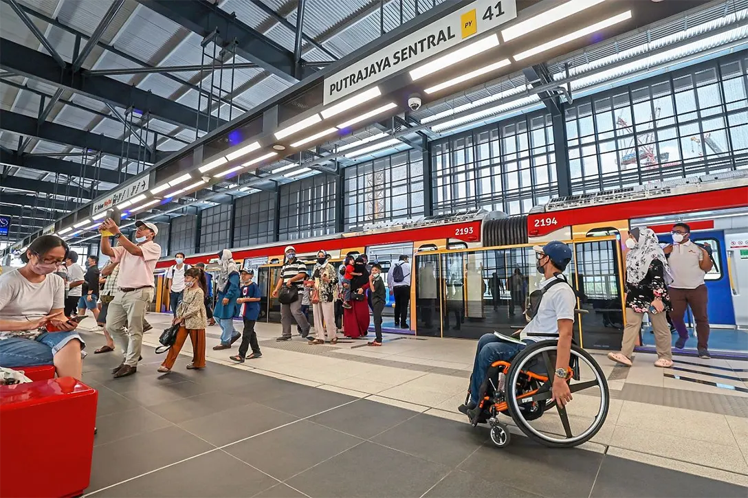 Greater mobility: Commuters arriving at Putrajaya Sentral soon after the new line began operating. — Bernama