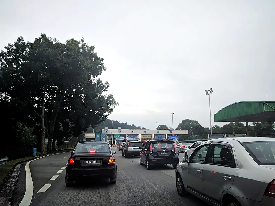 Vehicles driving towards the UPM Toll Plaza
